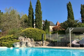 Wonderful ensemble of two houses, pool, outbuildings and gardens.