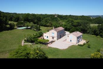 Two pretty stone houses, a pool, gardens and stunning views