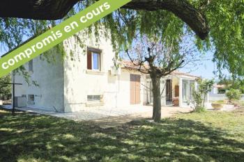 Au calme, une maison de qualité, garage et jardin