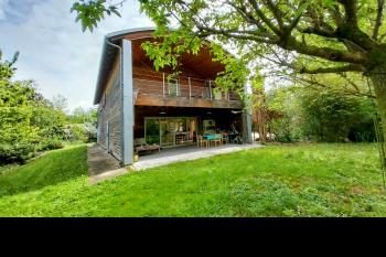 Architect designed house set in attractive wooded grounds
