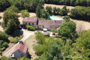 A lovely corps de ferme with outbuildings, pool and 2892m2 of gardens